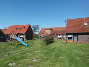 Ferienwohnung Muschel 2 mit gemeinschaftlichen Garten, Bensersiel